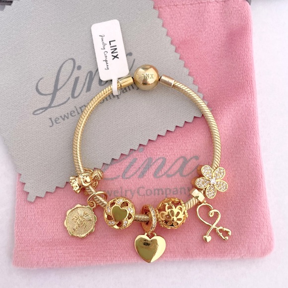 Linx Yellow Gold Snake Chain Bracelet with Registered Nurse Themed Charms - Picture 9 of 14